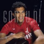 Arnold Vanderlyde (Date Unknown) at gym.

[keywords]Posed, Headshot, Eyecontact, Smiling[/keywords]